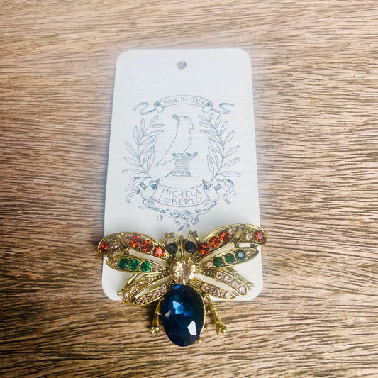 Spilla di alta moda con cristalli pregiati